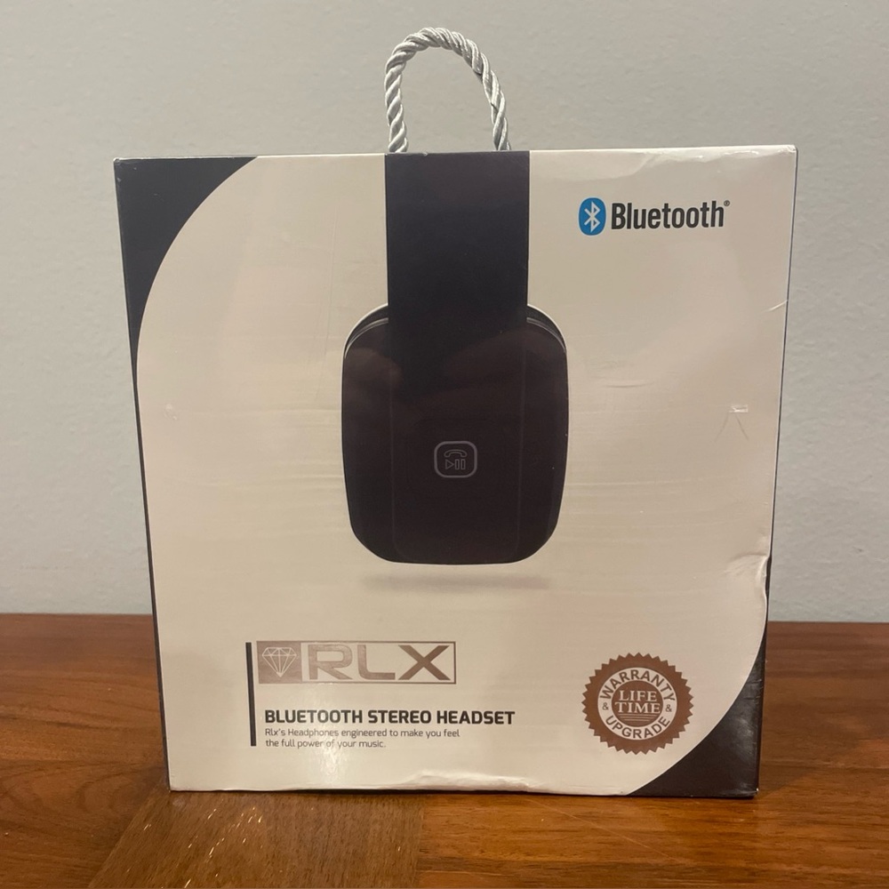 AUTHENTIC RLX BLUETOOTH STEREO BLACK HEADSET SEALED - RETAIL $499